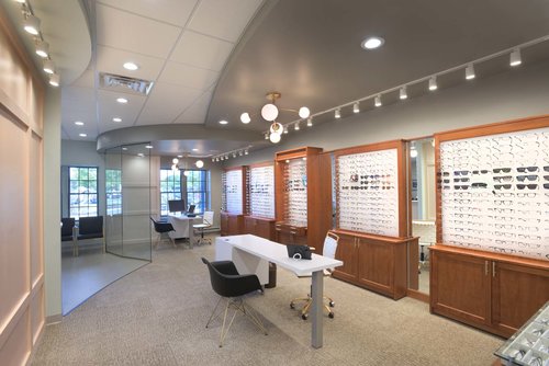 The eyewear wall and styling desk at Monroe Eye Care