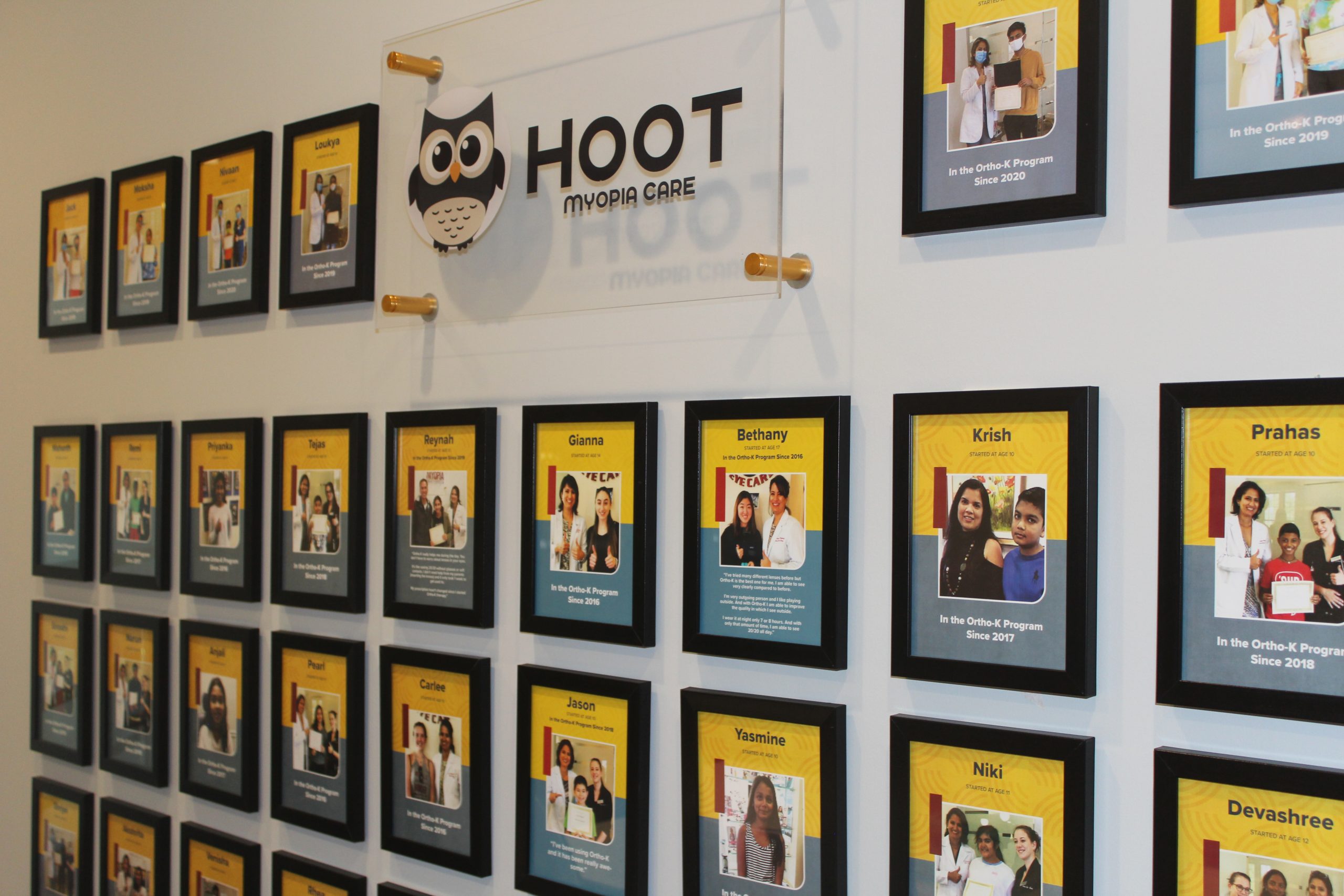 The Hoot Myopia Care wall of children in the Ortho-K program at Monroe Eye Care