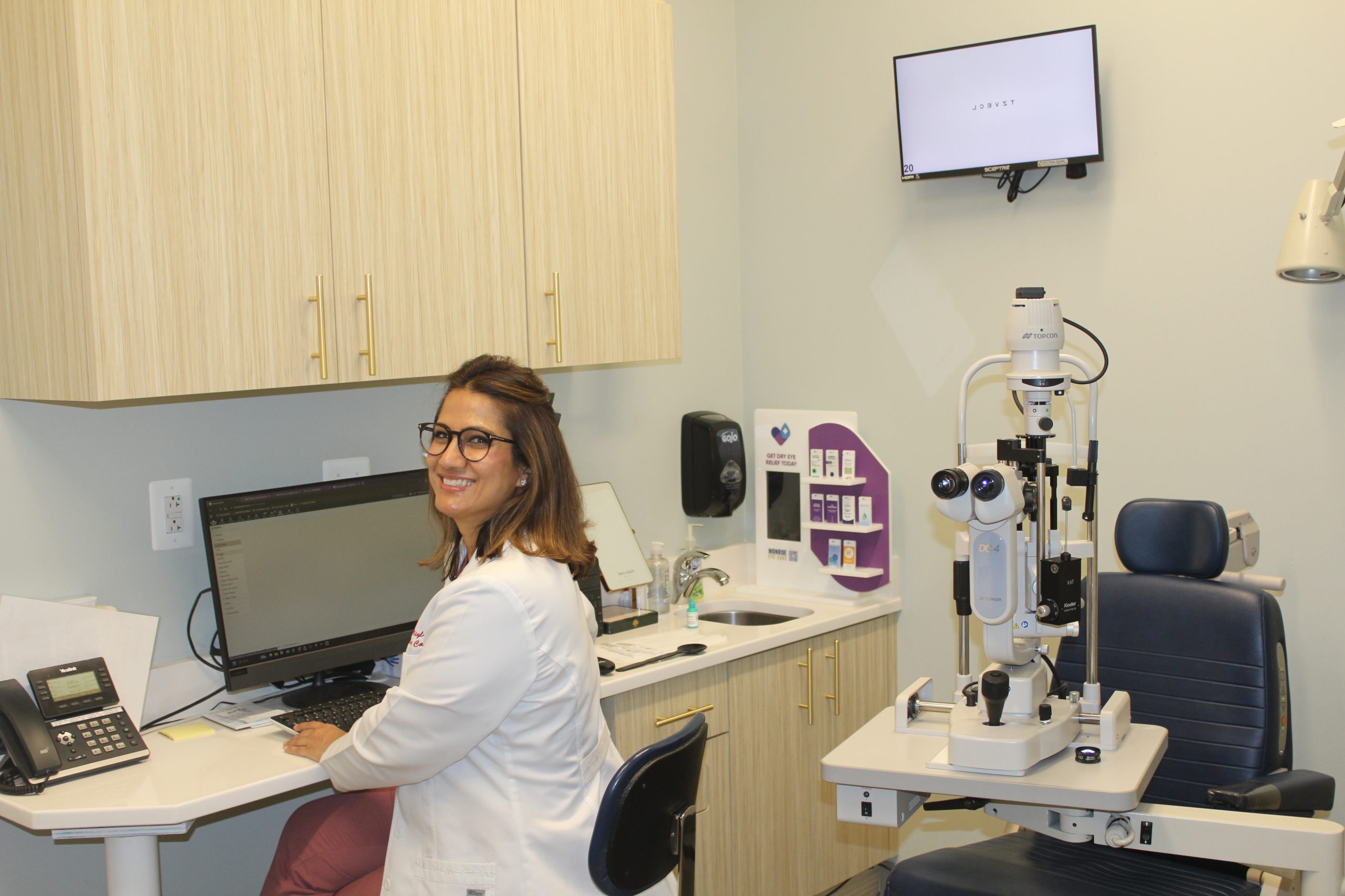 Dr. Shefali Miglani in the exam room at Monroe Eye Care